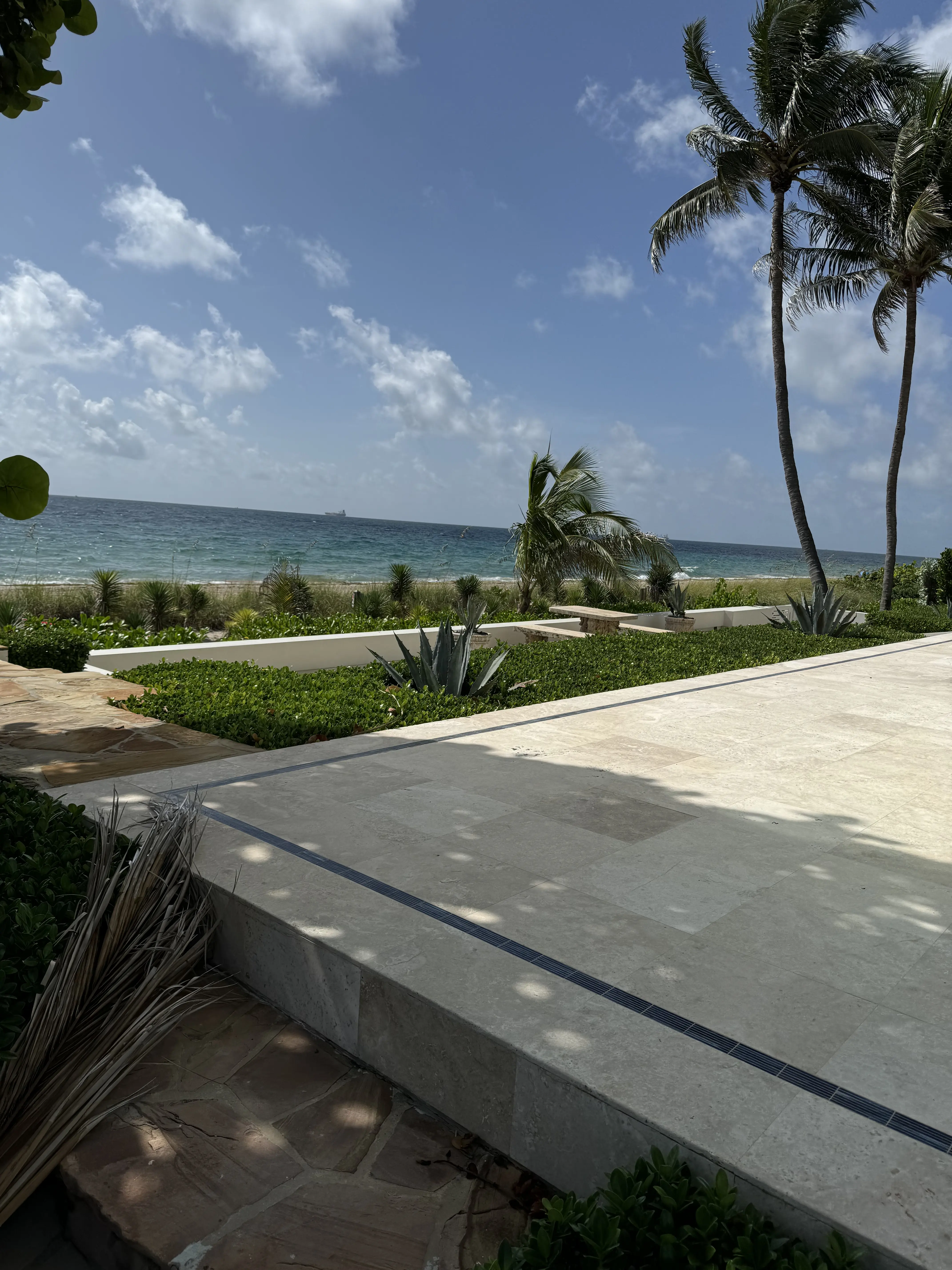 Freshly maintained coastal landscaping on a Pompano Beach property